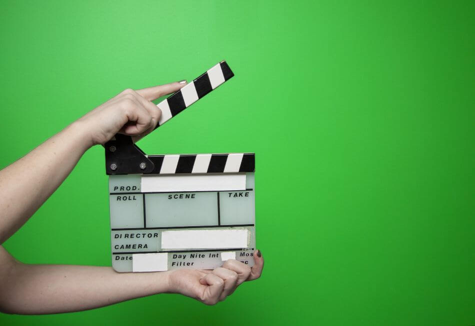 green screen with clackboard