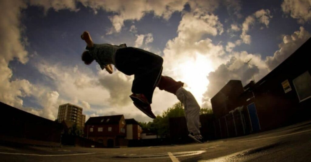 skateboarder flipping