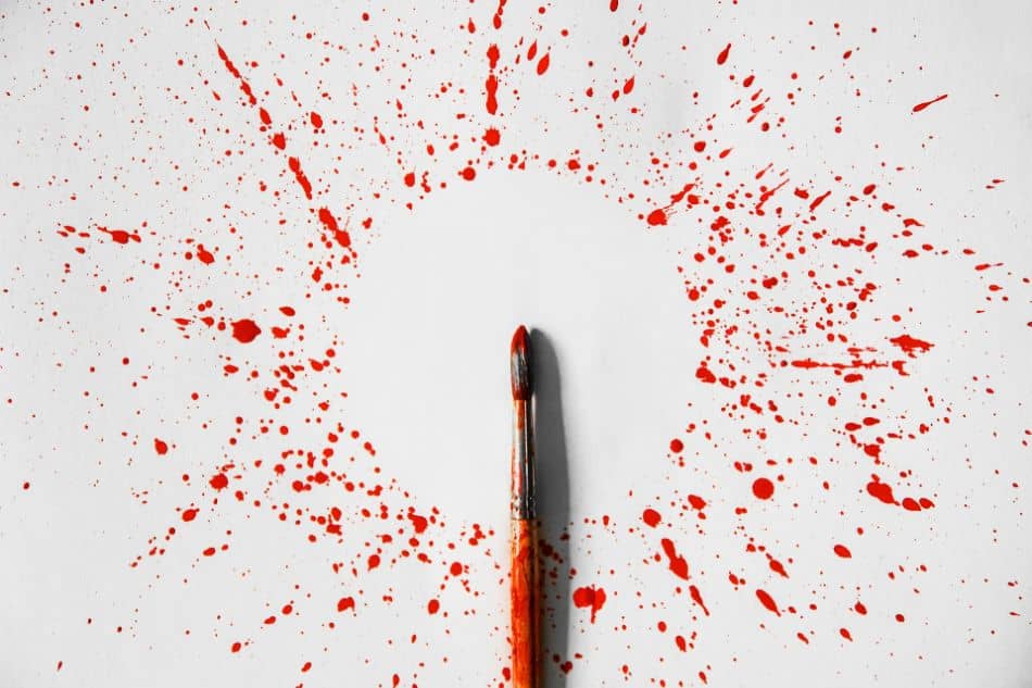 paintbrush with splattered red 1