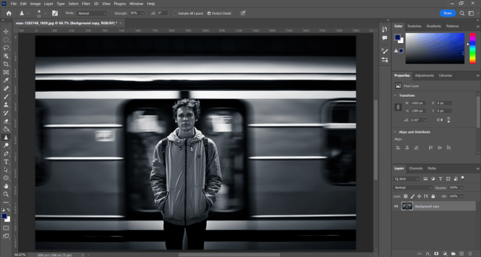 Photoshop man next to train